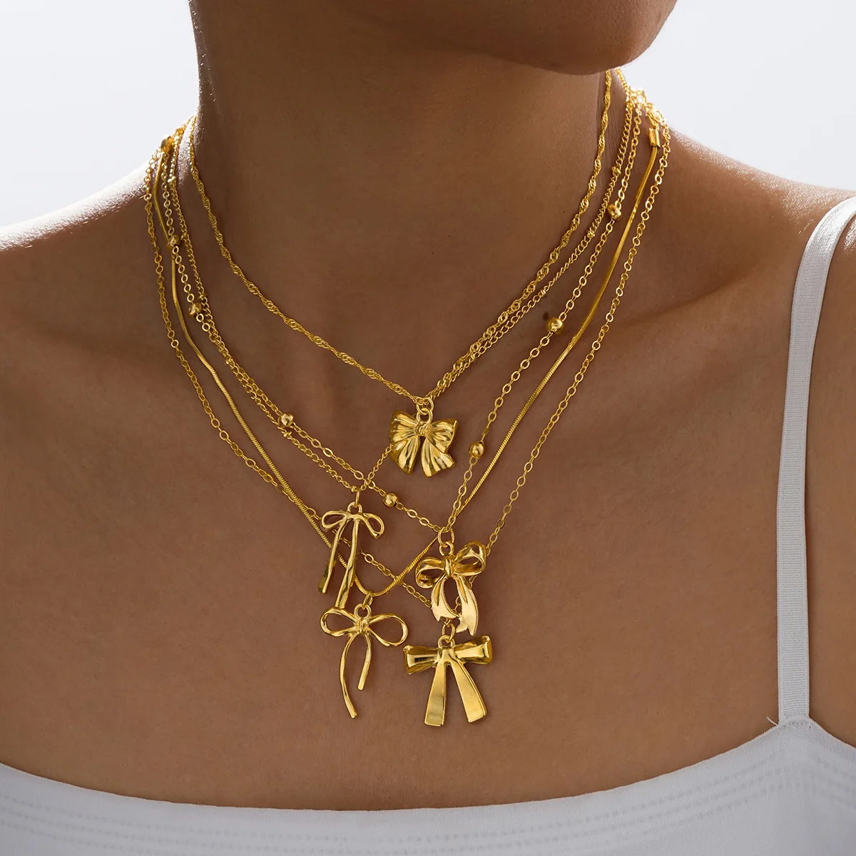 5pc Layered Bow Charm Necklace Set